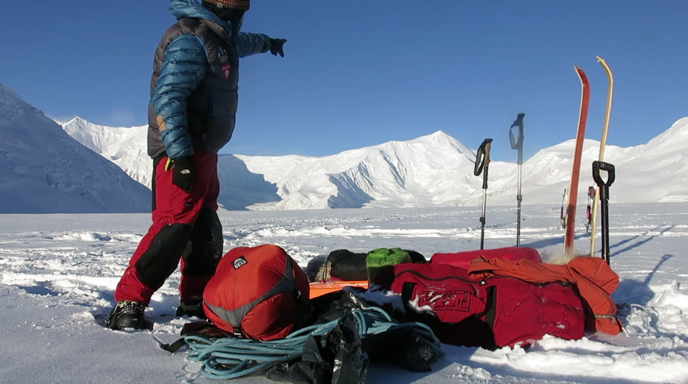 Freezing temperatures and problems with sleeping bags force climbers to