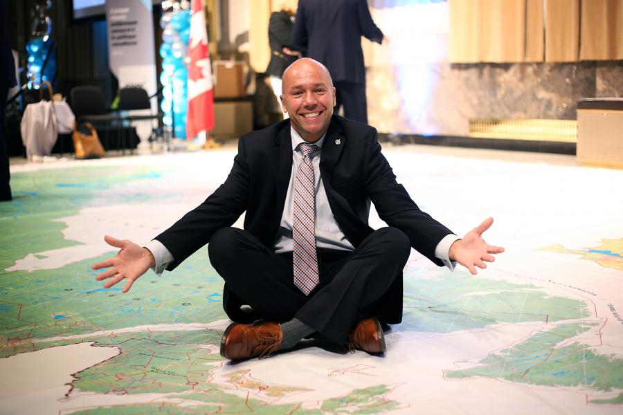 Photo: Alexandra Pope/Canadian Geographic Andy Fillmore MP on CPAC Route 338 giant floor map